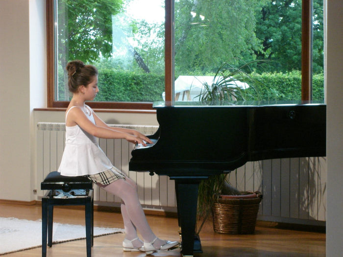 Xenia as a child and at the start of the road