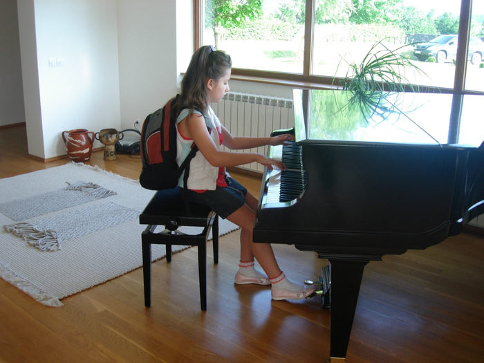 Xenia as a child and at the start of the road